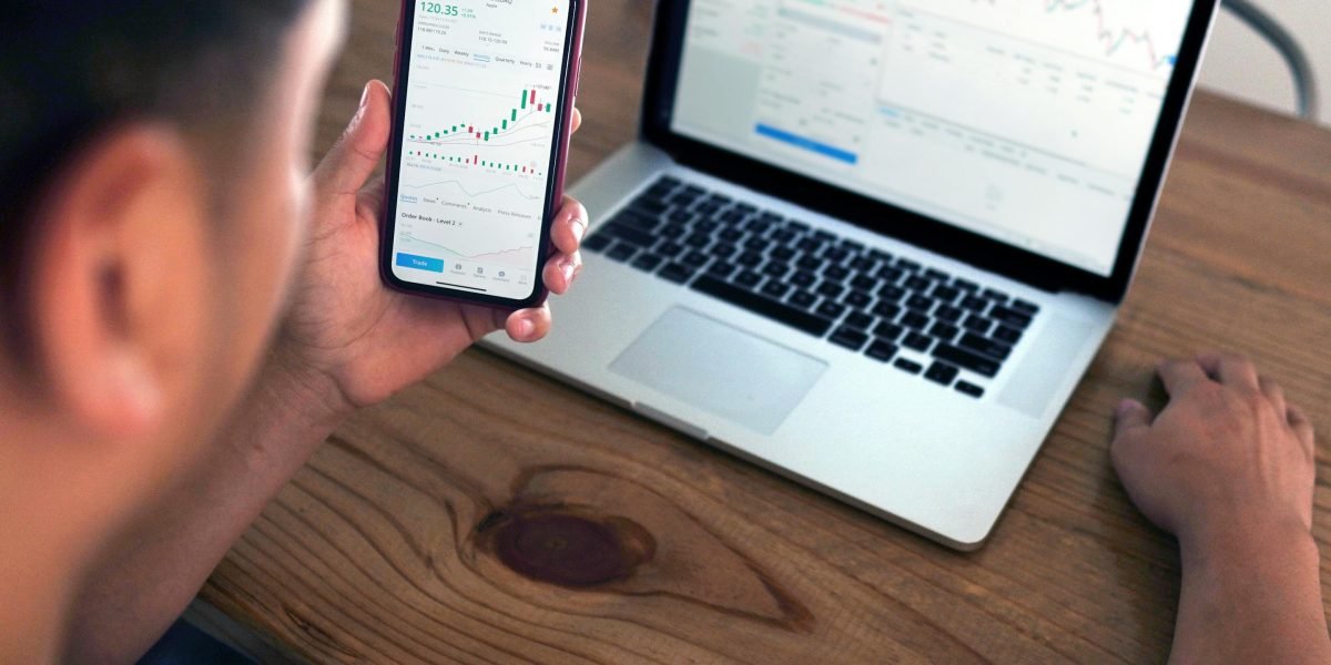 An investor strategically planning their diverse real estate portfolio for long-term growth.