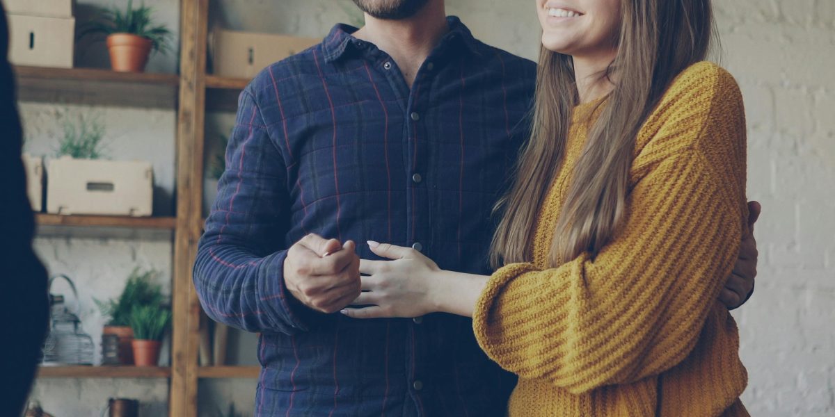 A person reflecting on the significant decision and emotions involved in purchasing a luxury home.