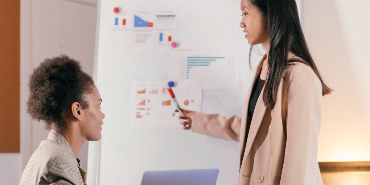 Professionals collaborate on strategies, envisioning the future of real estate with new technologies and sustainable practices.